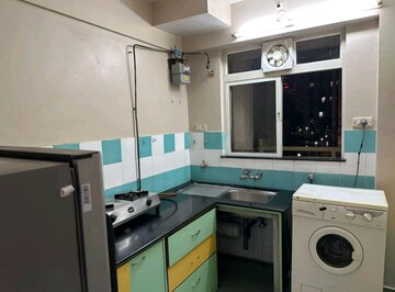 Kitchen in 1 BHK Apartment at Hiranandani Estate Penrose, Thane West – for Rent