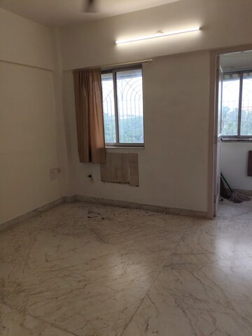 Room in 2 BHK Apartment at Juhu Jivan, Juhu – for Rent