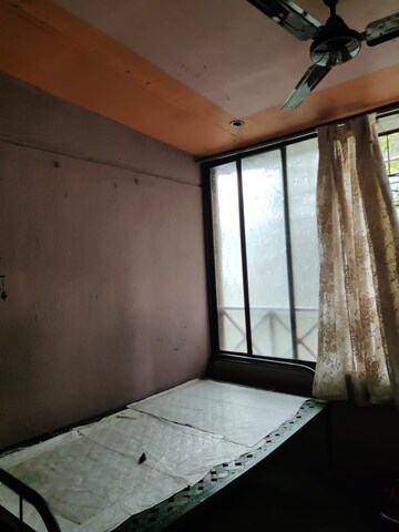 Bedroom in 1 BHK Apartment at SMH Nakshatra, Moshi – for Rent
