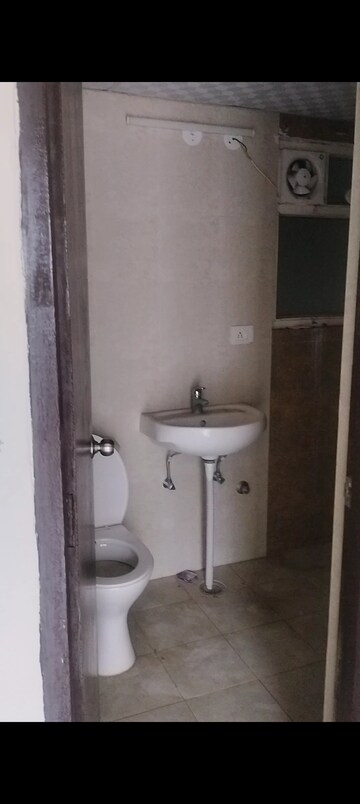 Bathroom in 2 BHK Apartment at Antriksh Golf Link, Sector 1 Greater Noida – for Rent