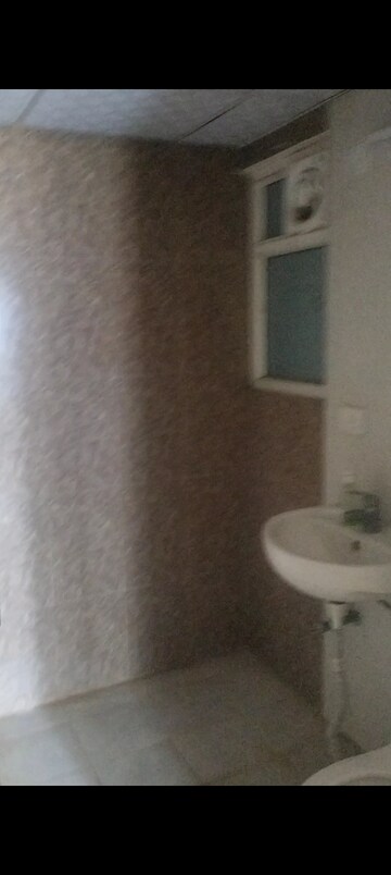 Bathroom in 2 BHK Apartment at Antriksh Golf Link, Sector 1 Greater Noida – for Rent