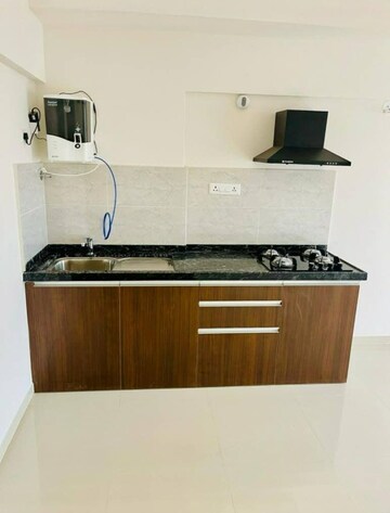 Kitchen in Studio Apartment at Gera World of Joy, Kharadi – for Rent