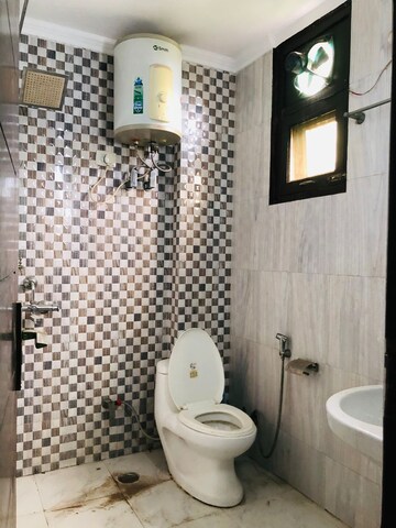 Bathroom in 4 BHK Builder Floor at Freedom Fighters Enclave – for Rent