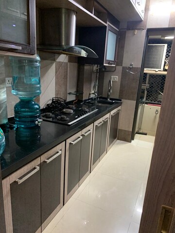 Kitchen in 2 BHK Apartment at Goyal Green Woods, Andheri East – for Rent