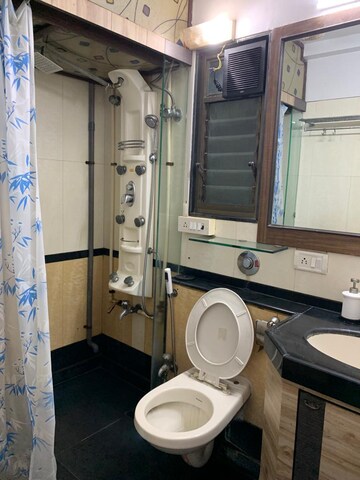 Bathroom in 2 BHK Apartment at Goyal Green Woods, Andheri East – for Rent