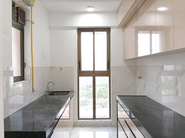 Kitchen in 2 BHK Apartment at Raymond Ten X Habitat, Pokhran Road No Two – for Rent