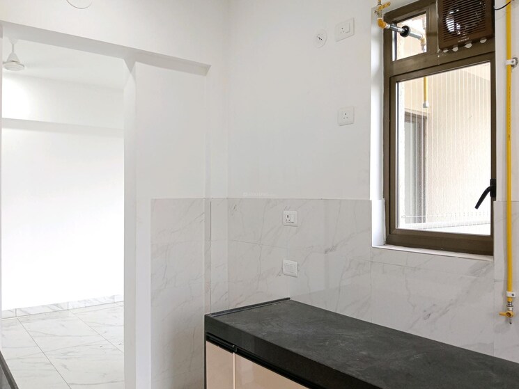 Kitchen, raymond-ten-x-habitat 2 Bedroom 595 Sq.Ft. Apartment In Pokhran Road No Two Thane 9067011