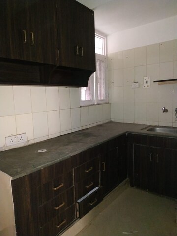 Kitchen in 1 BHK Apartment at Molarband Extension – for Sale