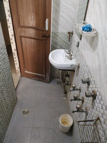 Bathroom in 1 BHK Apartment at Molarband Extension – for Sale