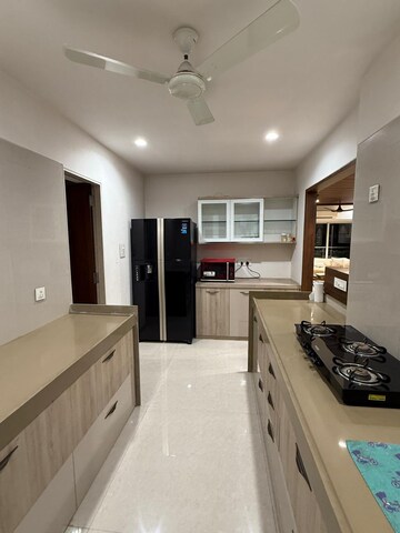 Kitchen in 4 BHK Apartment at Dosti Group Imperia, Manpada – for Rent