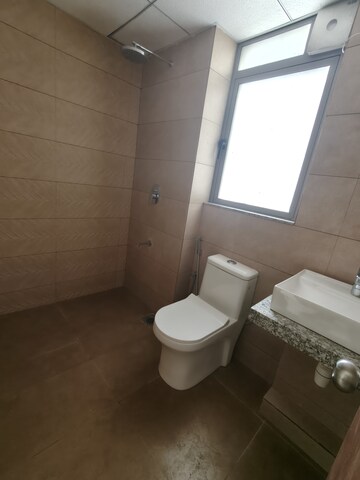 Bathroom in 2 BHK Apartment at Kalpataru Immensa, Kolshet Road – for Rent