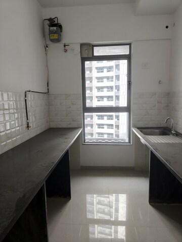 Kitchen in 2 BHK Apartment at Kalpataru Immensa, Kolshet Road – for Rent