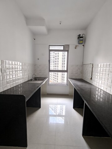 Kitchen in 2 BHK Apartment at Kalpataru Immensa, Kolshet Road – for Rent