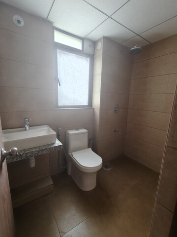 Bathroom in 2 BHK Apartment at Kalpataru Immensa, Kolshet Road – for Rent