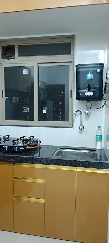 Kitchen in 1 BHK Apartment at Group Satellite Elegance, Goregaon East – for Rent