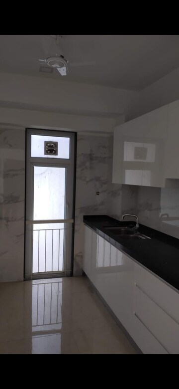 Room in 2 BHK Apartment at Ruparel Ariana, Parel – for Rent