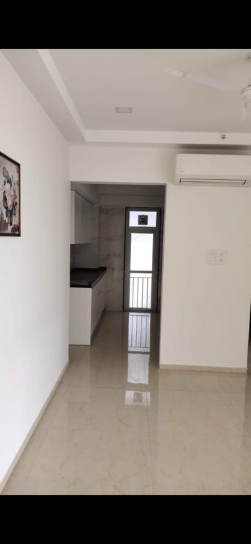 Room in 2 BHK Apartment at Ruparel Ariana, Parel – for Rent