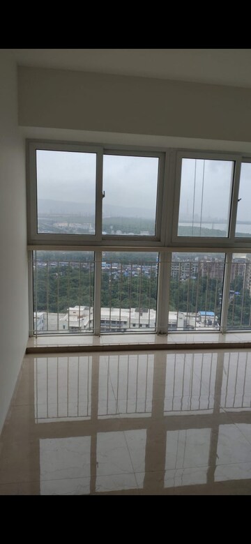 Room in 2 BHK Apartment at Ruparel Ariana, Parel – for Rent
