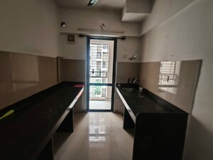 Kitchen in 1.5 BHK Apartment at Lodha Lakeshore Greens, Dombivli East – for Sale