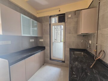 Kitchen in 1 BHK Apartment at Sheth Fiona, Pokhran Road No Two – for Rent