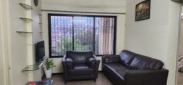 Living Room in 2 BHK Apartment at Riddhi Garden, Malad East – for Rent