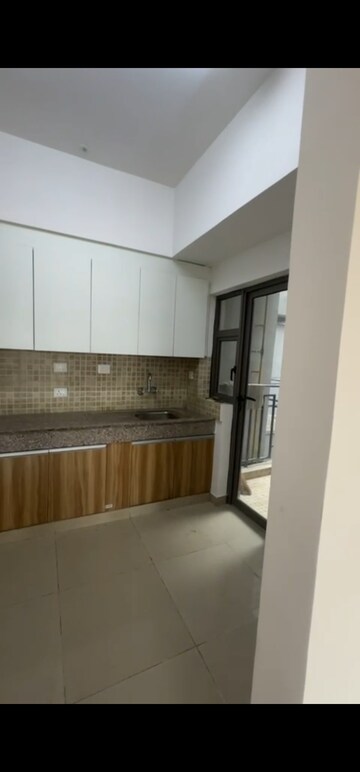 Kitchen in 2 BHK Apartment at Paras Dews, Sector 106 – for Rent