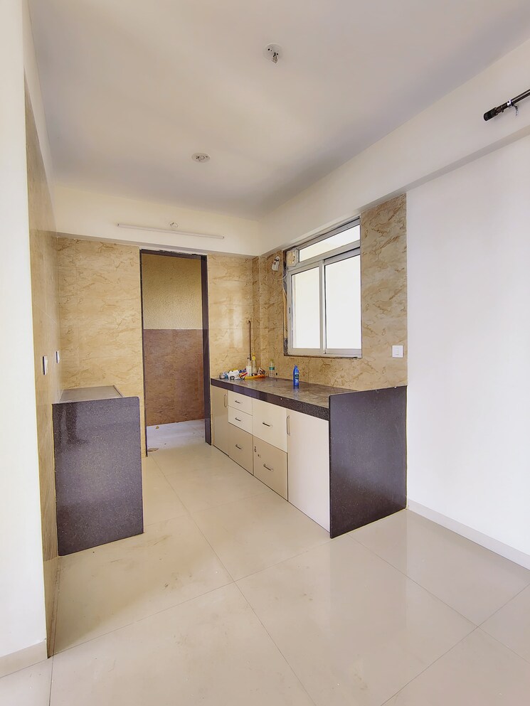 Kitchen, benchmark-cyprus 3 Bedroom 1350 Sq.Ft. Apartment In Punawale Pune 9067777