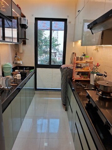 Kitchen in 1 BHK Apartment at Vistas CHS, Kavesar – for Sale
