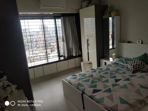 Bedroom in 2 BHK Apartment at Sanghvi Aaditya Pride, Girgaon – for Sale