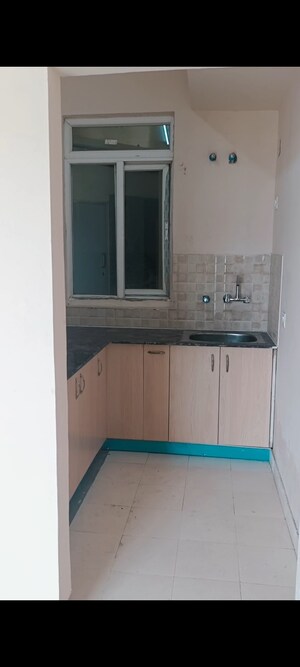 Kitchen in 1 BHK Apartment at Amrapali Dream Valley, Tech Zone 4 Greater Noida – for Sale