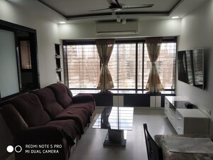 Living Room in 2 BHK Apartment at Amorina Heights, Grant Road West – for Sale