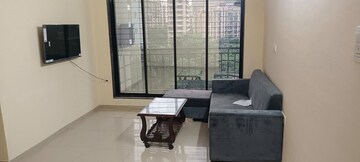 Living Room in 1 BHK Apartment at RNA NG Canary, Mira Road – for Rent