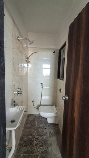 Bathroom in 1 BHK Apartment at Asiad Arcade, Bhandup West – for Rent