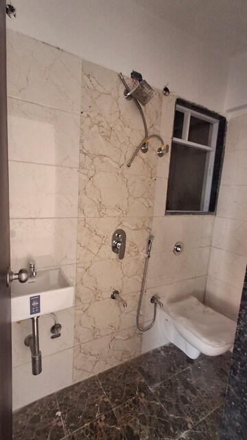 Bathroom in 1 BHK Apartment at Asiad Arcade, Bhandup West – for Rent