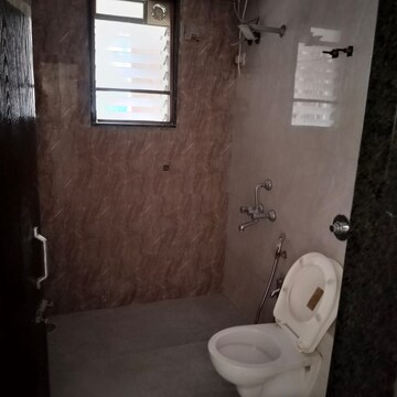 Bathroom in 1 BHK Apartment at Vrushali CHS, Tilak Nagar – for Rent
