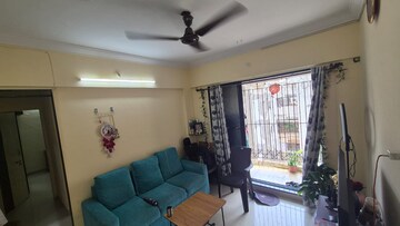 Living Room in 1 BHK Apartment at Vrushali CHS, Tilak Nagar – for Rent