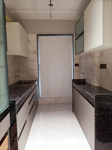 Kitchen in 2 BHK Apartment at JP North, Mira Road – for Rent