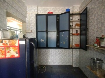 Kitchen in 1 BHK Apartment at Asha Nagar CHS, Mulund West – for Rent