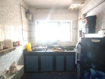 Kitchen in 1 BHK Apartment at Asha Nagar CHS, Mulund West – for Rent