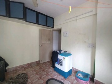 Bedroom in 1 BHK Apartment at Asha Nagar CHS, Mulund West – for Rent