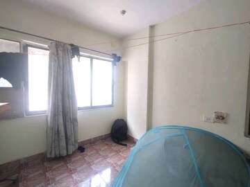 Bedroom in 1 BHK Apartment at Asha Nagar CHS, Mulund West – for Rent