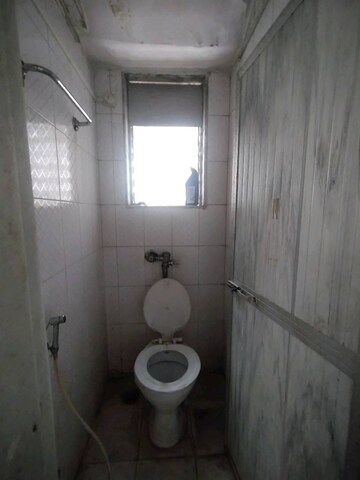 Bathroom in 1 BHK Apartment at Asha Nagar CHS, Mulund West – for Rent