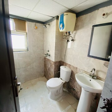 Bathroom in 3 BHK Apartment at Gardenia Golf City, Noida Central – for Rent