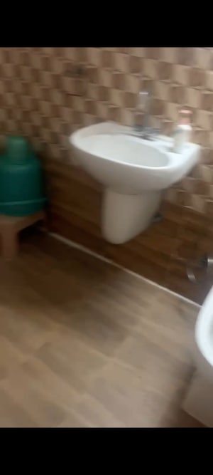 Bathroom in 3 BHK Apartment at Town Park White Orchid, Sector 16c Greater Noida – for Sale