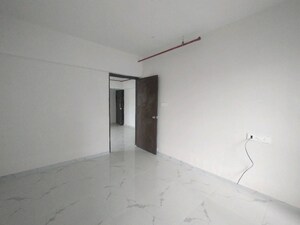 Master Bedroom in 2 BHK Apartment at Aspire Residency, Mulund West – for Sale