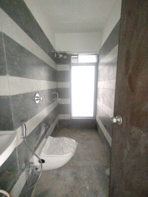 Bathroom in 2 BHK Apartment at Aspire Residency, Mulund West – for Sale