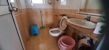 Bathroom in 2 BHK Apartment at Jasmine Tower, Vasant Vihar – for Rent