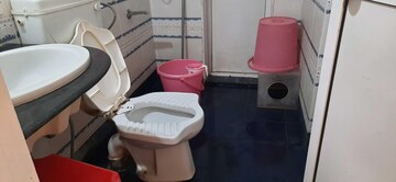 Bathroom in 2 BHK Apartment at Jasmine Tower, Vasant Vihar – for Rent