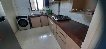 Kitchen in 2 BHK Apartment at Jasmine Tower, Vasant Vihar – for Rent