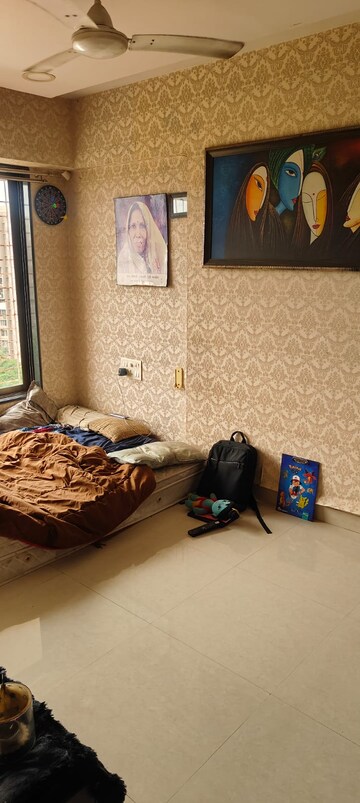 Living Room in 2 BHK Apartment at Tilak Shanti CHS, Tilak Nagar – for Rent